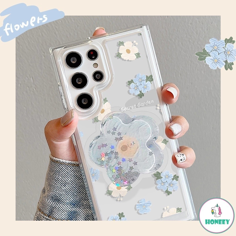 เคสโทรศัพท์มือถือ TPU ใส กันกระแทก ลายดอกไม้ สีฟ้า พร้อมขาตั้ง สําหรับ Galaxy S23 Ultra S24 Ultra Plus A50 A50s A30s A32 A04 A12 M12 A54 5G