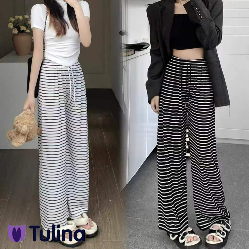 กางเกงเป็นแบบเกาหลีสไตล์สไตล์ ลายลายดำขาว ผ้าอ่อนนุ่ม สวมใส่สบาย สไตล์ทันสมัย