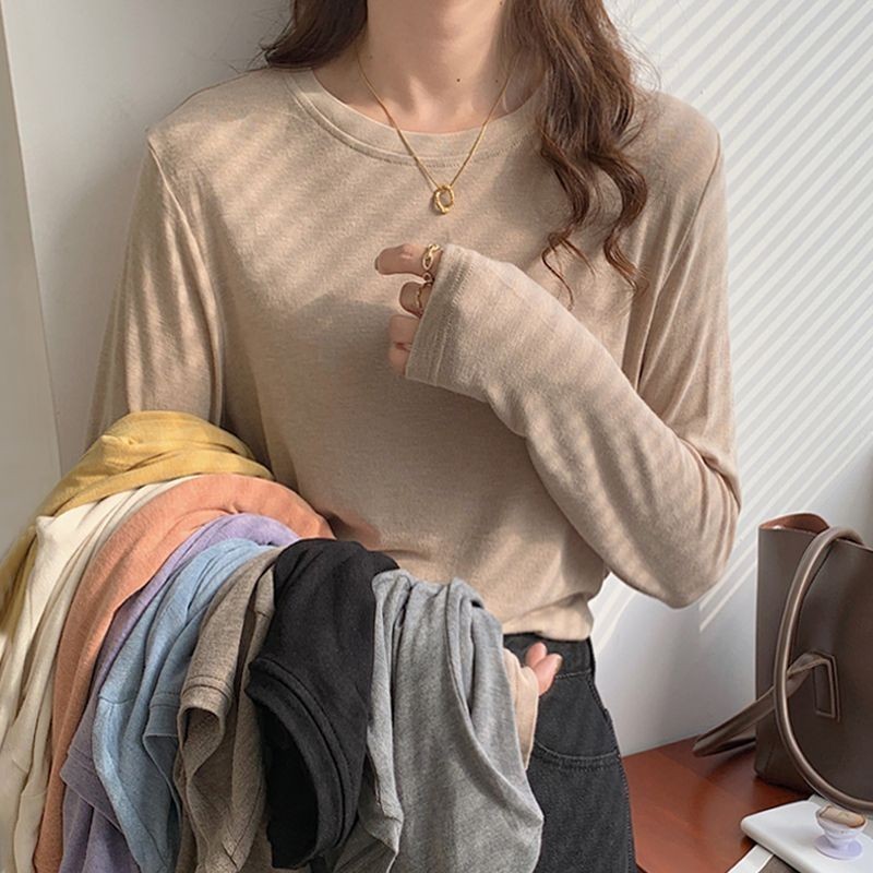 เสื้อแขนยาวลําลอง คอกลม แบบนิ่ม ทรงหลวม สีพื้น แบบเรียบง่าย แฟชั่นสําหรับสตรี