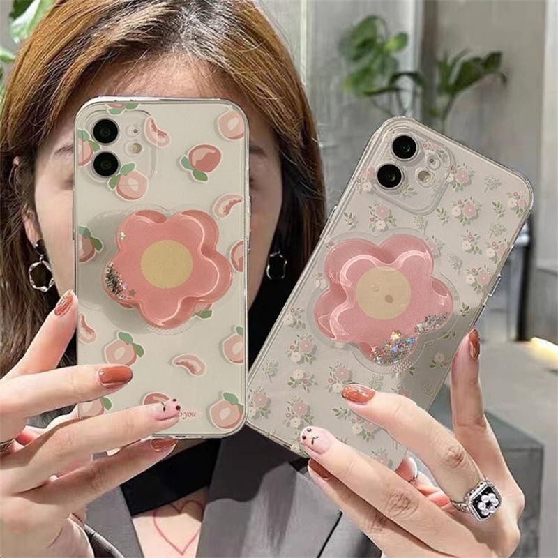 เคสโทรศัพท์มือถือ ซิลิโคนนิ่ม TPU ใส มีทรายไหล ลายดอกไม้สีชมพู พร้อมสายคล้องข้อมือ แฟชั่น สําหรับ Samsung Galaxy S20 S21 S22 S23 S24 Plus Ultra S20FE S21FE S23FE