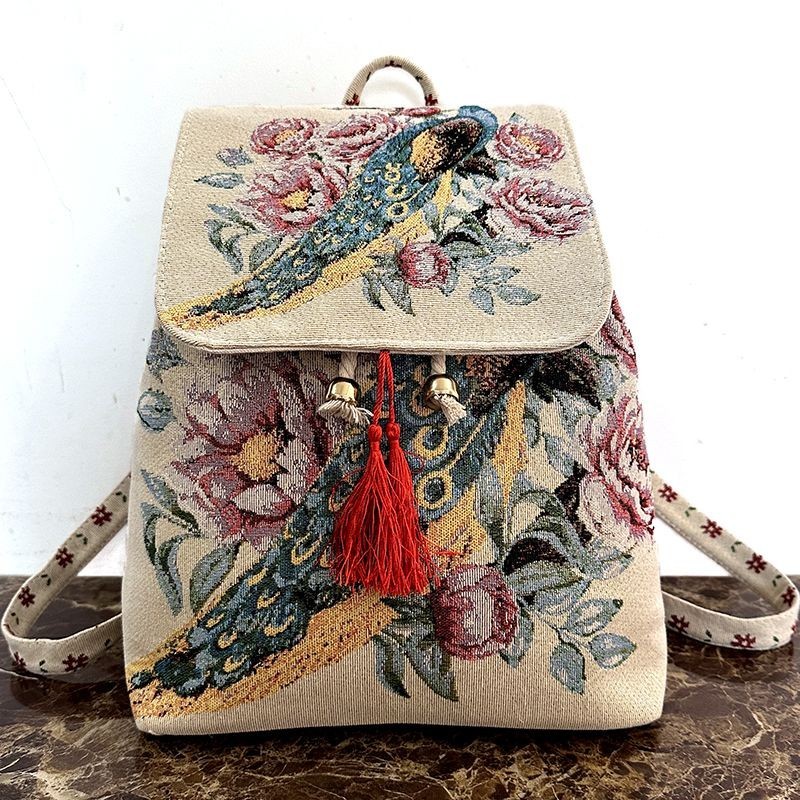 2024 ยูนนานสไตล์ชาติพันธุ์กระเป๋าปักผ้าใบกระเป๋าคู่ไหล่กระเป๋า Bac2024云南 风包CROSS帆布包双肩包背包女学大游金丝花