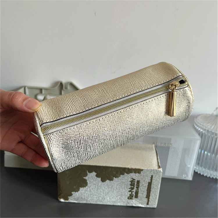Estee Lauder Platinum Series กระเป๋าคลัทช์ กระเป๋าเครื่องสําอาง ทรงกระบอก สีทอง