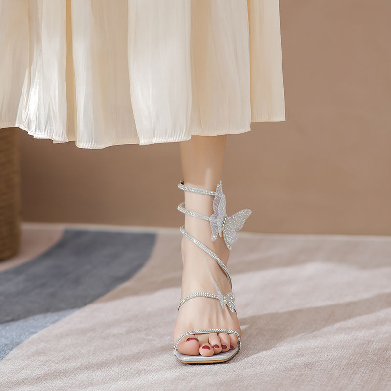 Xyj Boutique Rhinestone รองเท ้ าแตะผู ้ หญิงฤดูร ้ อน Wizard of Oz สไตล ์ ส ้ นหนางูรูป Twisted Laced-Up รองเท ้ าแตะโรมันรองเท ้ าส ้ นสูง 2024 สไตล ์ ใหม ่