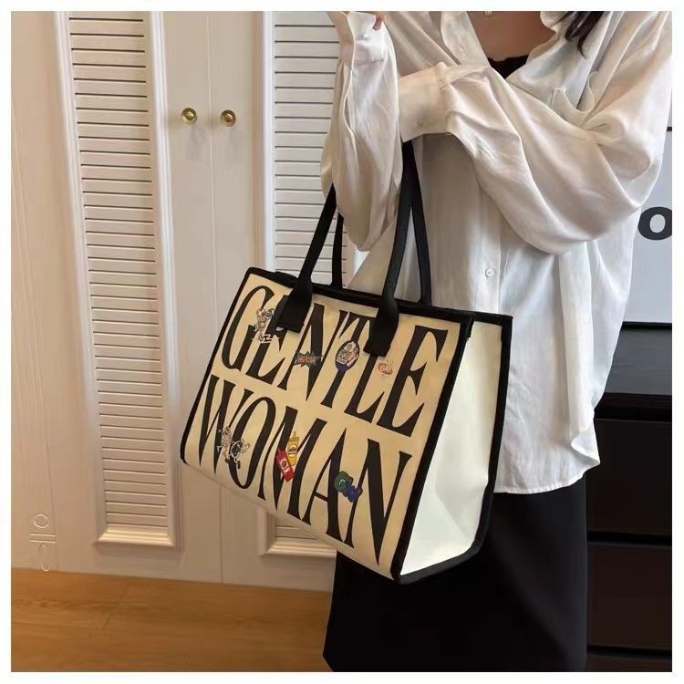 ขายดี โปรโมชั่น% [gentlewoman Bag] กระเป๋าถือ กระเป๋าสะพายไหล่ ผ้าแคนวาส ทรงโท้ท ขนาดใหญ่ จุของได้เยอะ พิมพ์ลายตัวอักษร สําหรับผู้หญิง คุณแม่