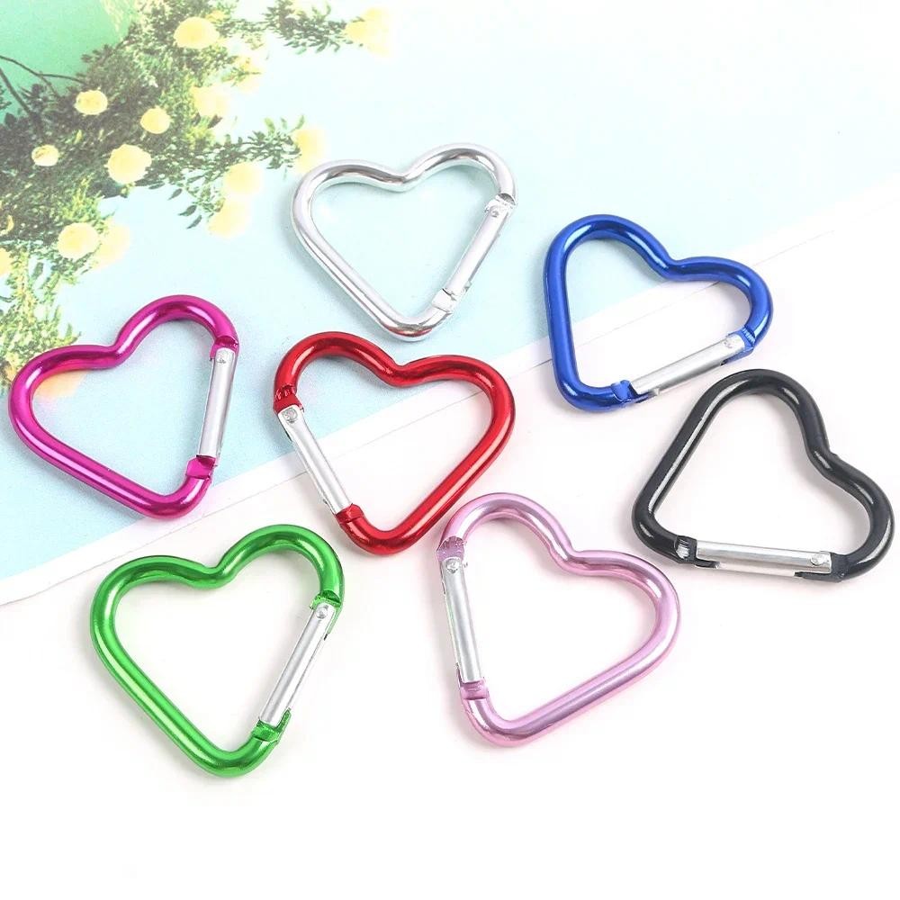 5 ชิ้นกลางแจ้ง Carabiner รูปหัวใจพวงกุญแจคลิปอลูมิเนียมแหวนปีนเขาคลิปฤดูใบไม้ผลิ Snap Hook Carabiner ทนทาน - รูปที่ 2