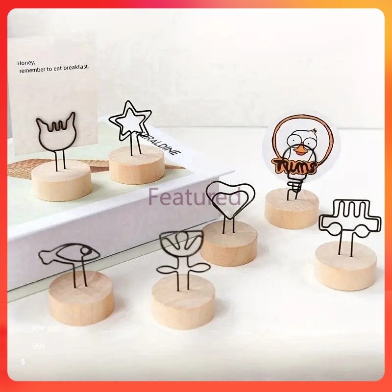 Featured คลิปหนีบกระดาษโน๊ต คลิปหนีบรูปภาพ กระดาษโน้ต ฐานไม้ สำหรับตกแต่งบ้าน ตั้งโต๊ะ ออฟฟิศ ราคา ถูกที่สุด ดีลบีเคเค