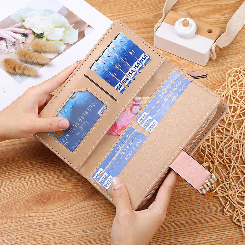 กระเป๋าสตางค์ใบยาวผู้หญิงแฟชั่น Hollowed-out Leaf-Shaped Zipper Hasp Wallet