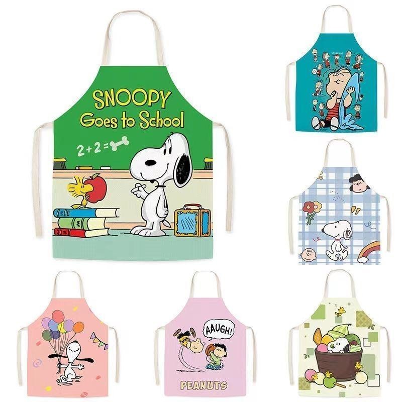 ผ้ากันเปื้อน ผ้าลินิน ลายการ์ตูนสุนัข Snoopy Peanuts น่ารัก งานฝีมือ สําหรับพ่อแม่ และเด็กผู้ชาย และผู้หญิง เหมาะกับการทําอาหาร