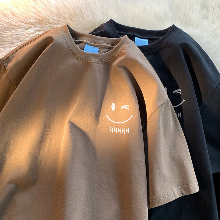 เสื้อยืด Oversize เสื้อคู่ พิมพ์ลายหน้ายิ้ม ทรงหลวม ขนาดใหญ่ แบบเรียบง่าย สไตล์อเมริกัน สําหรับผู้ชาย