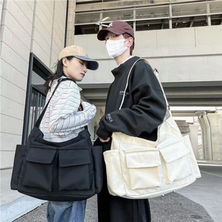 2025 ใหม่ Commuter Messenger กระเป๋าผ้าใบกระเป๋าถือลําลองขนาดใหญ่ความจุบุคลิกภาพ Simple Elegant อเนกประสงค์นักเรียน Retro กระเป๋านักเรียน