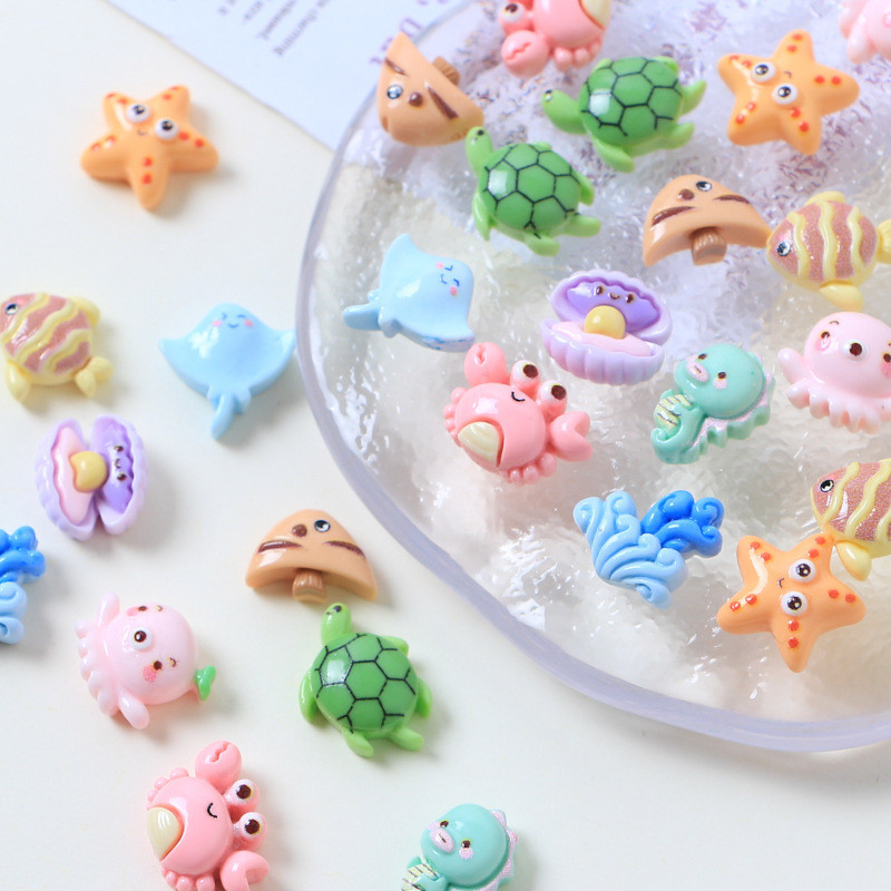 พวงกุญแจเรซิ่น รูปปลามหาสมุทร ขนาดเล็ก แวววาว แฮนด์เมด diy สําหรับตกแต่งเล็บ กิ๊บติดผม ต่างหู เคสโทรศัพท์