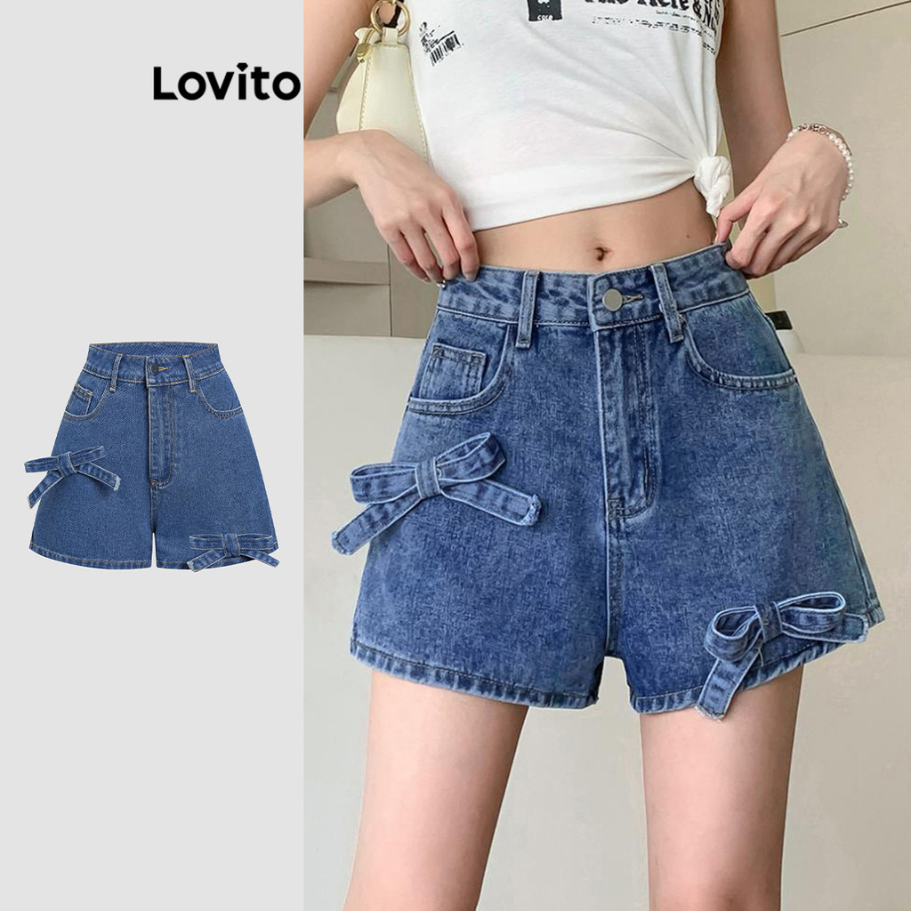 Lovito กางเกงขาสั้นยีนส์ทรงโบว์สีพื้นลำลองสำหรับผู้หญิง ขนาด L L117AD0279