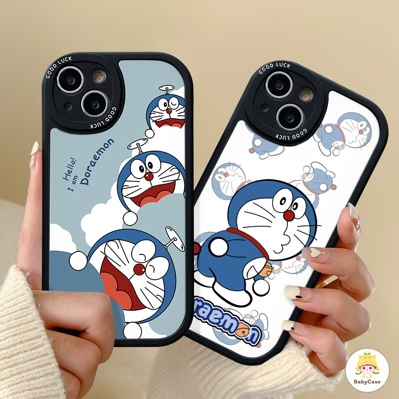 การ์ตูนโดเรมอนกรณีแมวน่ารักเข้ากันได้ iPhone 11 12 13 14 Pro Max 7Plus 8Plus XR X XS Max เลนส์รูปไข่ Shockporof Soft ปก