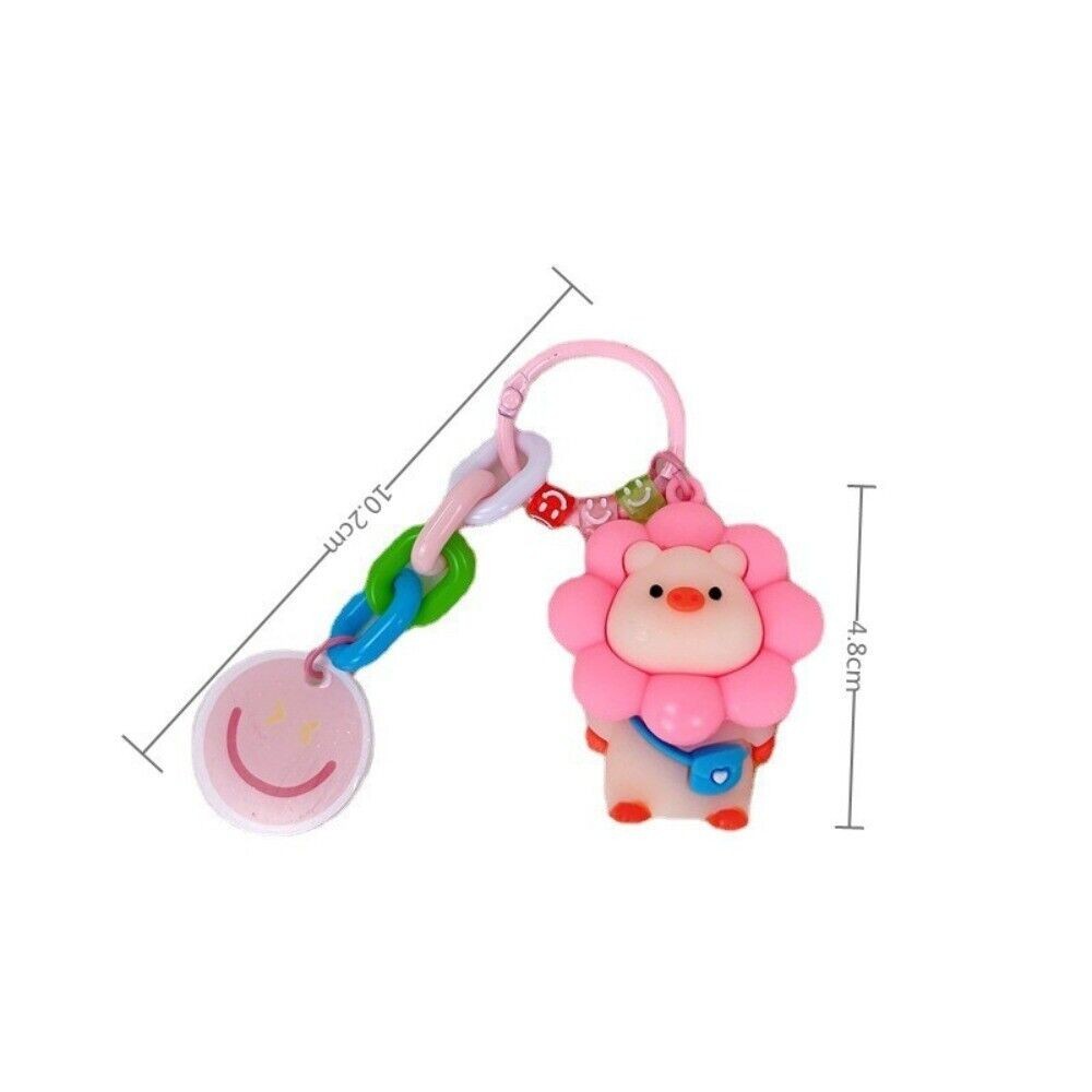 การ์ตูนหมูดอกทานตะวันเรซิ่นพวงกุญแจน่ารักรถพวงกุญแจสร้างสรรค์นักเรียนกระเป๋าเป้สะพายหลังจี้ตกแต่ง - รูปที่ 7