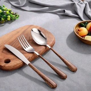 ชุดเครื่องใช้ทำจากสแตนเลส ด้ามไม้ที่มีความหรูหราและรูปแบบที่…