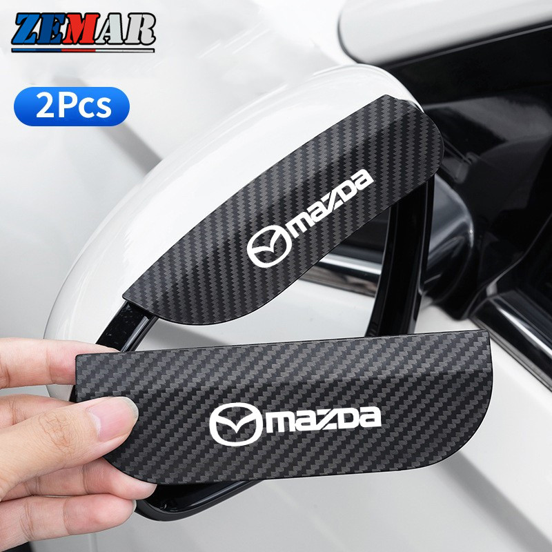 สติกเกอร์คาร์บอนไฟเบอร์ กันฝน สําหรับติดกระจกมองหลังรถยนต์ Mazda 2 3 CX5 CX30 CX8 CX3 Mazda2 6 5 CX9 BT50 2 ชิ้น