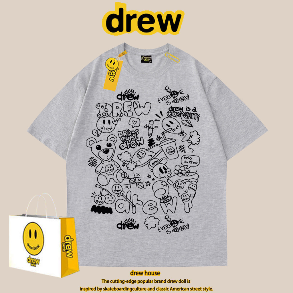 Drev เสื้อยืดแขนสั้นลําลอง พิมพ์ลายหน้ายิ้ม ทรงหลวม แฟชั่นคู่รัก สําหรับผู้ชาย และผู้หญิง