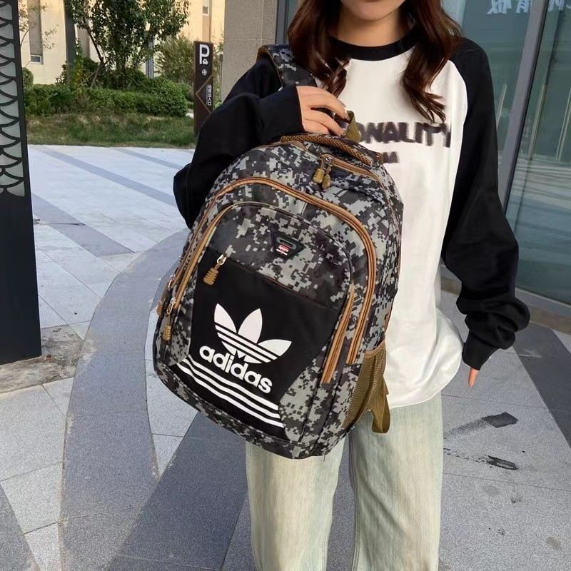 Adidasกระเป๋านักเรียนกระเป๋าเป้สะพายหลัง