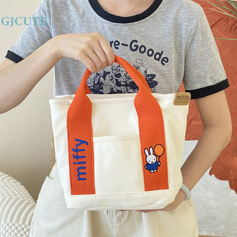 Gjcute กระเป๋าถือ กระเป๋าเดินทาง ผ้าแคนวาส ลําลอง ความจุขนาดใหญ่ สีพื้น สําหรับสตรี WTD - รูปที่ 5