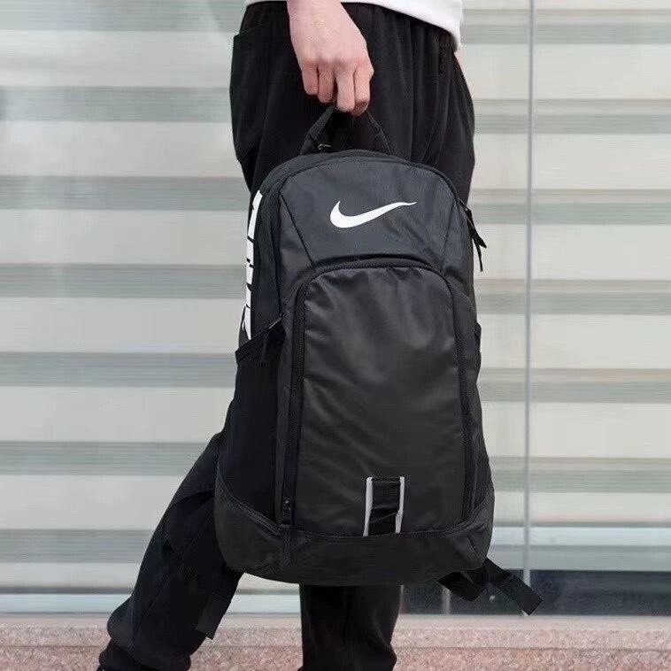 Nike NIKE AIR นักเรียนชายและหญิงความจุขนาดใหญ่กระเป๋าเป้สะพายหลังกระเป๋าเป้สะพายหลังเบาะลมกีฬากระเป
