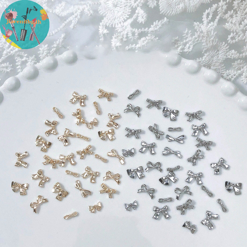 Renbg ริบบิ้นโบว์โลหะ 3D สีเงิน สีทอง สําหรับตกแต่งเล็บ DIY 50 100 ชิ้น