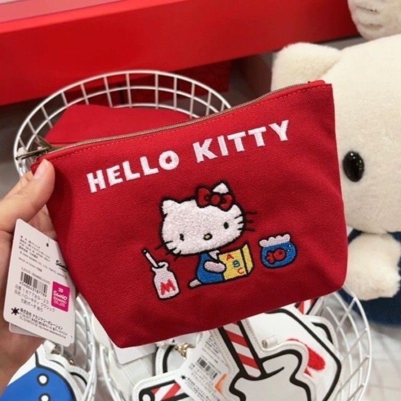 Hello Kitty กระเป๋าใส่เหรียญผ้าใบน่ารักแบบพกพาเย็บปักถักร้อยความจุขนาดใหญ่กระเป๋าแต่งหน้าการจัดเก็บความงามสูงถุงแป้ง