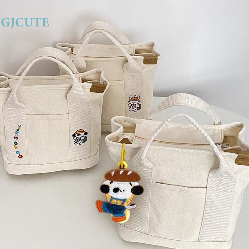 Gjcute กระเป๋าถือ กระเป๋าช้อปปิ้ง ผ้าแคนวาส สีพื้น สําหรับผู้หญิง WTD