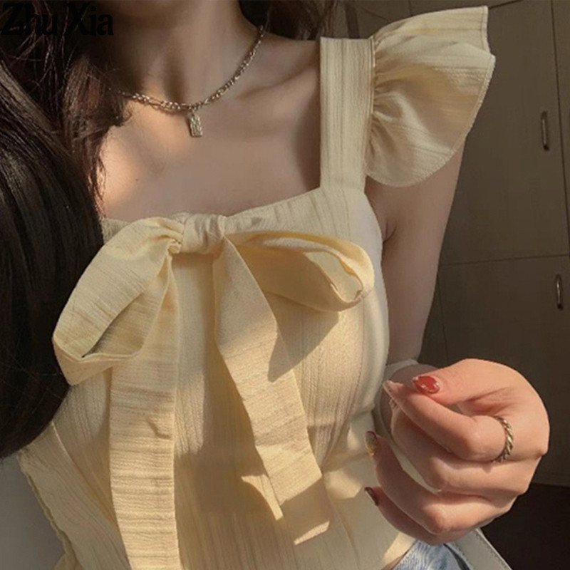 เสื้อสายเดี่ยวผู้หญิง แขนระบาย สั้น สีพื้น เสื้อกั๊ก ฤดูร้อน สไตล์เกาหลี อเนกประสงค์ และเสื้อสายเดี่ยว อเนกประสงค์ พร้อมแผ่นรองหน้าอก