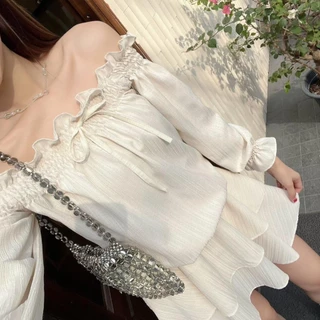 Emma mini dress : เดรสปาดไหล่แขนยาว แต่งจั้มเอว ชายระบาย2ชั้น เนื้อผ้าลายเปลือกไม้ KN.Clothes