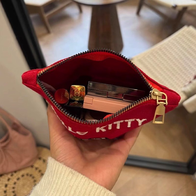 Hello Kitty กระเป๋าใส่เหรียญผ้าใบน่ารักแบบพกพาเย็บปักถักร้อยความจุขนาดใหญ่กระเป๋าแต่งหน้าการจัดเก็บความงามสูงถุงแป้ง
