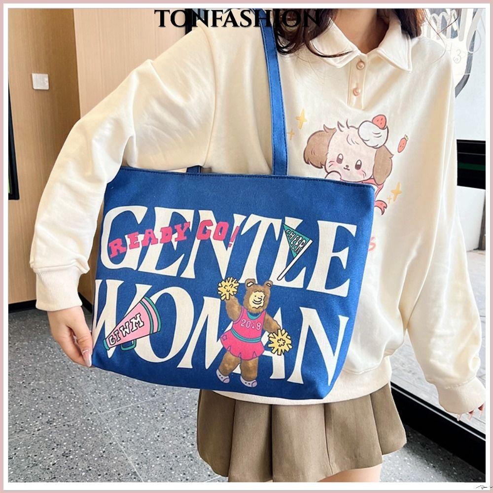 Tonfashion กระเป๋าสะพายไหล่ กระเป๋าถือ ผ้าแคนวาส พิมพ์ลายการ์ตูน น้ําหนักเบา จุของได้เยอะ สีสันสดใส สําหรับสตรี