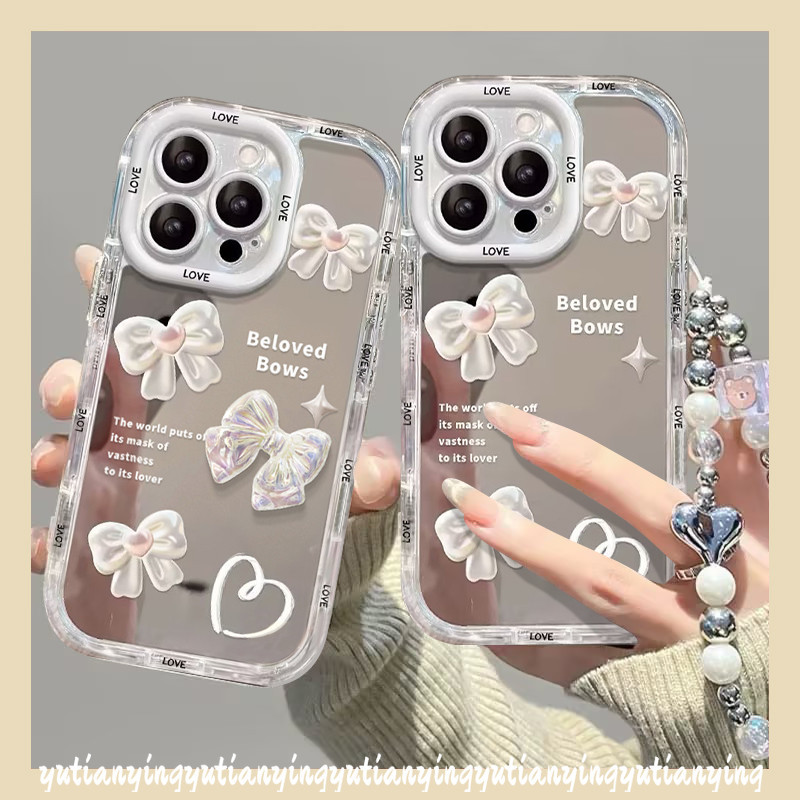 เคสโทรศัพท์มือถือ ลายตัวอักษรภาษาอังกฤษ หัวใจ โบว์ พร้อมกระจกแต่งหน้า และสายคล้องข้อมือ หรูหรา สําหรับ IPhone 11 15 13 14 12 Pro Max XR XS Max X 7 8 15 Plus