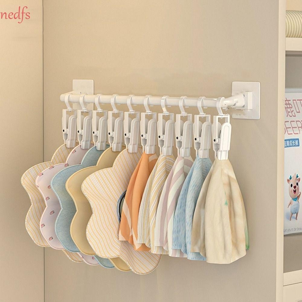 Nedfs ราวแขวนตู้เสื้อผ้าเด็ก พลาสติก สีขาว ไม่ต้องเจาะผนัง แขวนได้จริง พร้อมคลิป ปรับได้ ตะขอแขวนผ้าขนหนู น้ําลายเด็ก สําหรับบ้าน