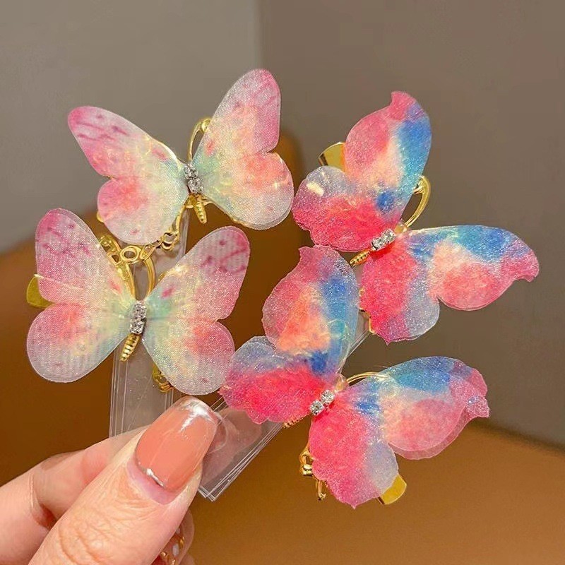 กิ๊บติดผม ผ้ากอซ แต่งพู่ ลายผีเสื้อ ไล่โทนสี สีสันสดใส สไตล์เจ้าหญิง สําหรับเด็กผู้หญิง จํานวน 2 ชิ้น - รูปที่ 2