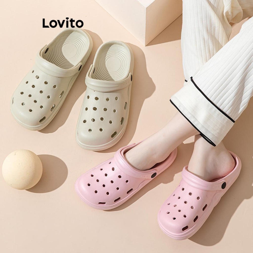 Lovito รองเท้าแตะหัวโตผู้หญิง ส้นเตี้ย สีเรียบ สไตล์ลำลอง LFA25036