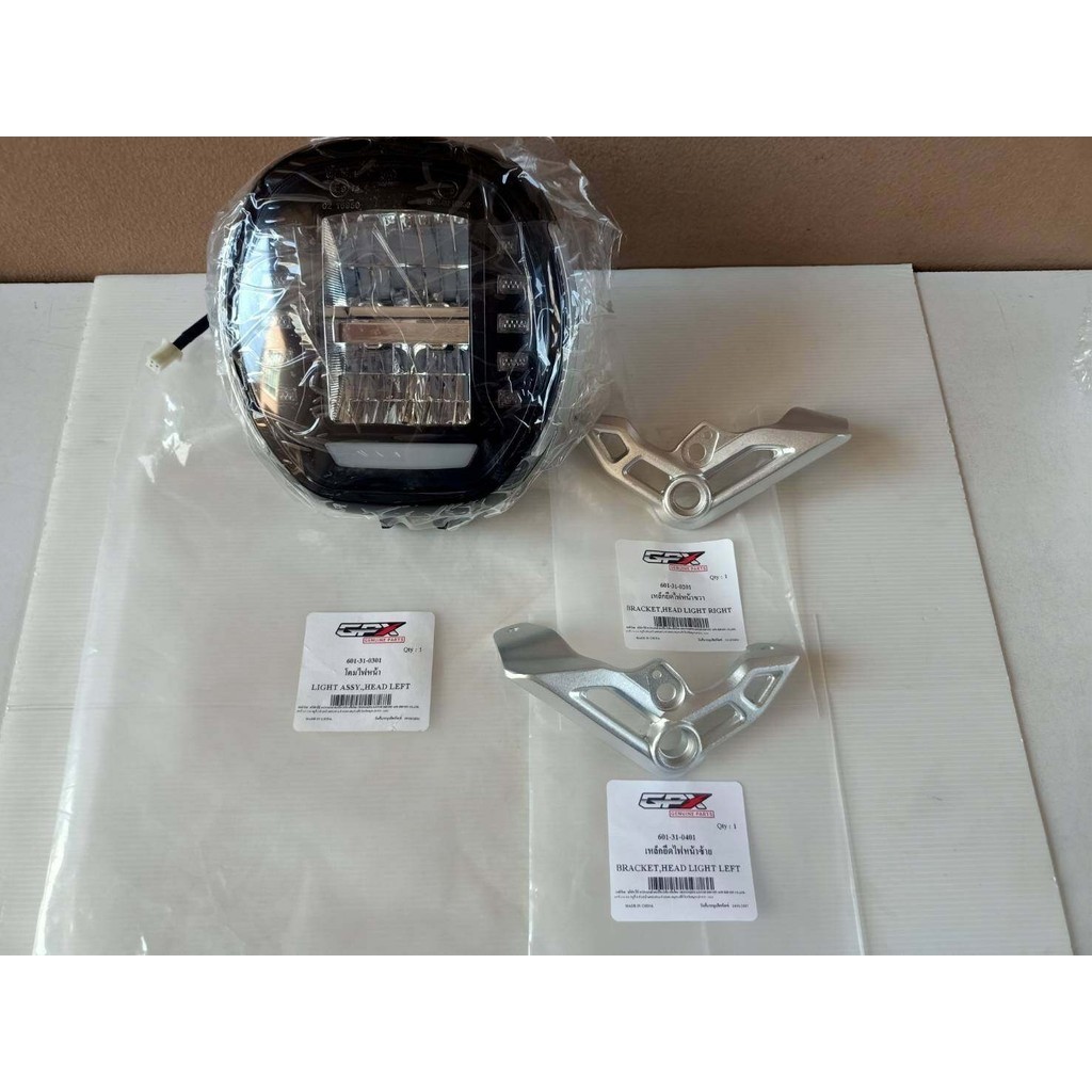 (Mad300)  โคมไฟหน้า เหล็กยึดโคมไฟหน้า GPX Mad300  ของแท้เบิกศูนย์