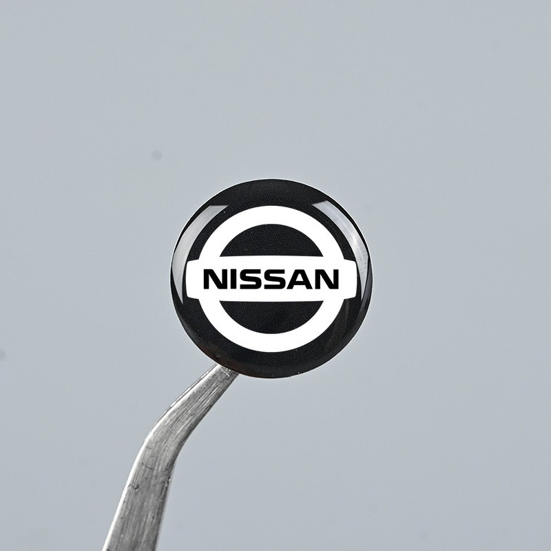 สติกเกอร์โลโก้รถยนต์ ทรงกลม ลาย Nissan Kicks Almera Navara Terra Leaf March Note Sylphy Teana Xtrail สําหรับตกแต่งรถยนต์ 1 ชิ้น
