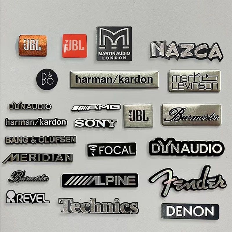 มีผลบังคับใช้ ป้ายเครื่องเสียงรถยนต์ ป้ายบุคลิกภาพ Harman Kardon Yan Feilishi สติ๊กเกอร์ตกแต่งลำโพง โลโก้โลหะสร้างสรรค์ เหมาะสำหรับ Honda, Toyota, Ford, Audi, Lexus, Hyundai, Nissan
