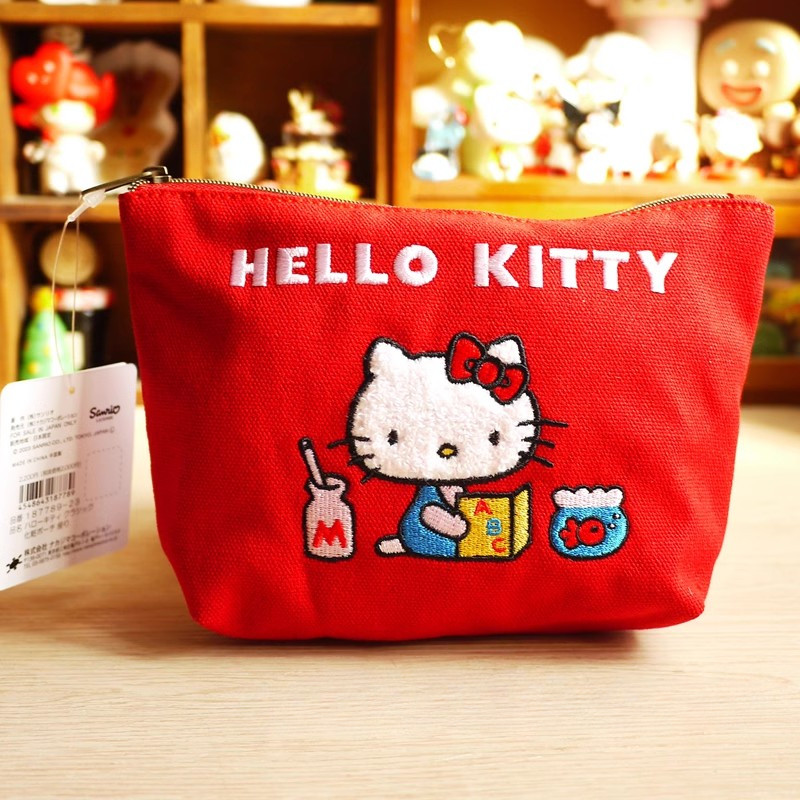 Hello Kitty กระเป๋าใส่เหรียญผ้าใบน่ารักแบบพกพาเย็บปักถักร้อยความจุขนาดใหญ่กระเป๋าแต่งหน้าการจัดเก็บความงามสูงถุงแป้ง