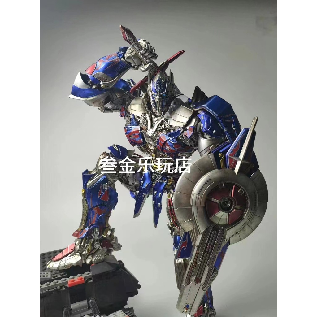 Optimus Assembly รุ่น Cool Sky Fire รูป King Kong Boy Cool ของเล่น Deformable แห่งชาติอินเทรนด์เครื่องประดับ Mystery กล่องของขวัญ
