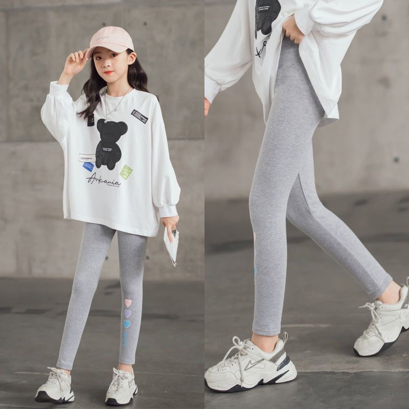 ปเลกกิ้งสีดําสําหรับเด็กสาวแฟชั่นกางเกงผอมสําหรับเด็กสาวที่มีคุณภาพสูง เลกกิ้ง น่ารักพิมพ์หัวใจการบีบอัด เลกกิ้ง กางเกงกีฬาเกาหลีสําหรับเด็กหญ