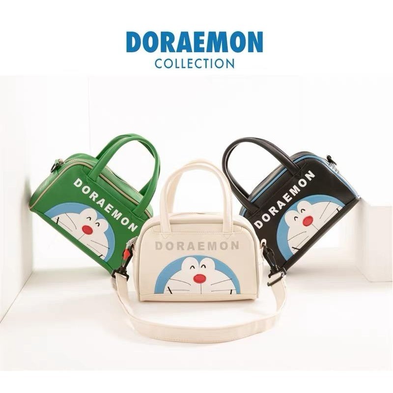 ใหม่ กระเป๋าสะพายข้าง หนัง PU ลายการ์ตูนโดราเอมอน สีดํา แบบพกพา แฟชั่นฤดูใบไม้ร่วง และฤดูหนาว