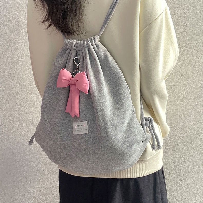 กระเป๋าเป้สะพายหลังลําลอง อเนกประสงค์ ประดับโบว์ แบบเรียบง่าย สไตล์สปอร์ต สําหรับผู้หญิง