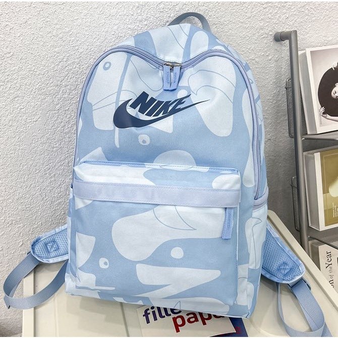 Nike กระเป๋าเป้สะพายหลังแนวโน้มนักเรียนชายและหญิงกระเป๋านักเรียนคอมพิวเตอร์สันทนาการกีฬาเป้เดินทาง