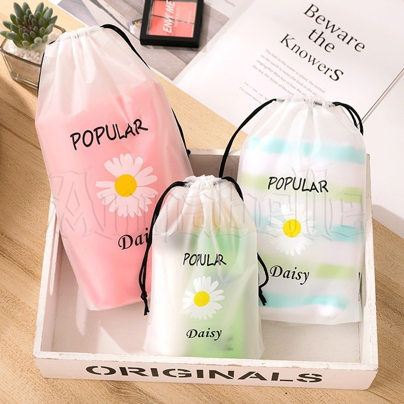 [ขายดี] กระเป๋าหูรูด ลายดอกเดซี่ แบบใส / กระเป๋าเก็บเสื้อผ้า ผ้าขนหนู แบบพกพา เดินทาง / กระเป๋าเครื่องสําอาง พลาสติก กันน้ํา / กระเป๋าจัดระเบียบ กันฝุ่น ความจุขนาดใหญ่