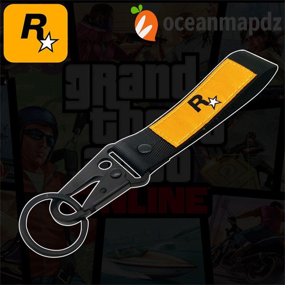 Oceanmapdz GTA5 พวงกุญแจรถยนต์ โลโก้ RockStar JDM สีเหลือง สายรัดไนล่อน