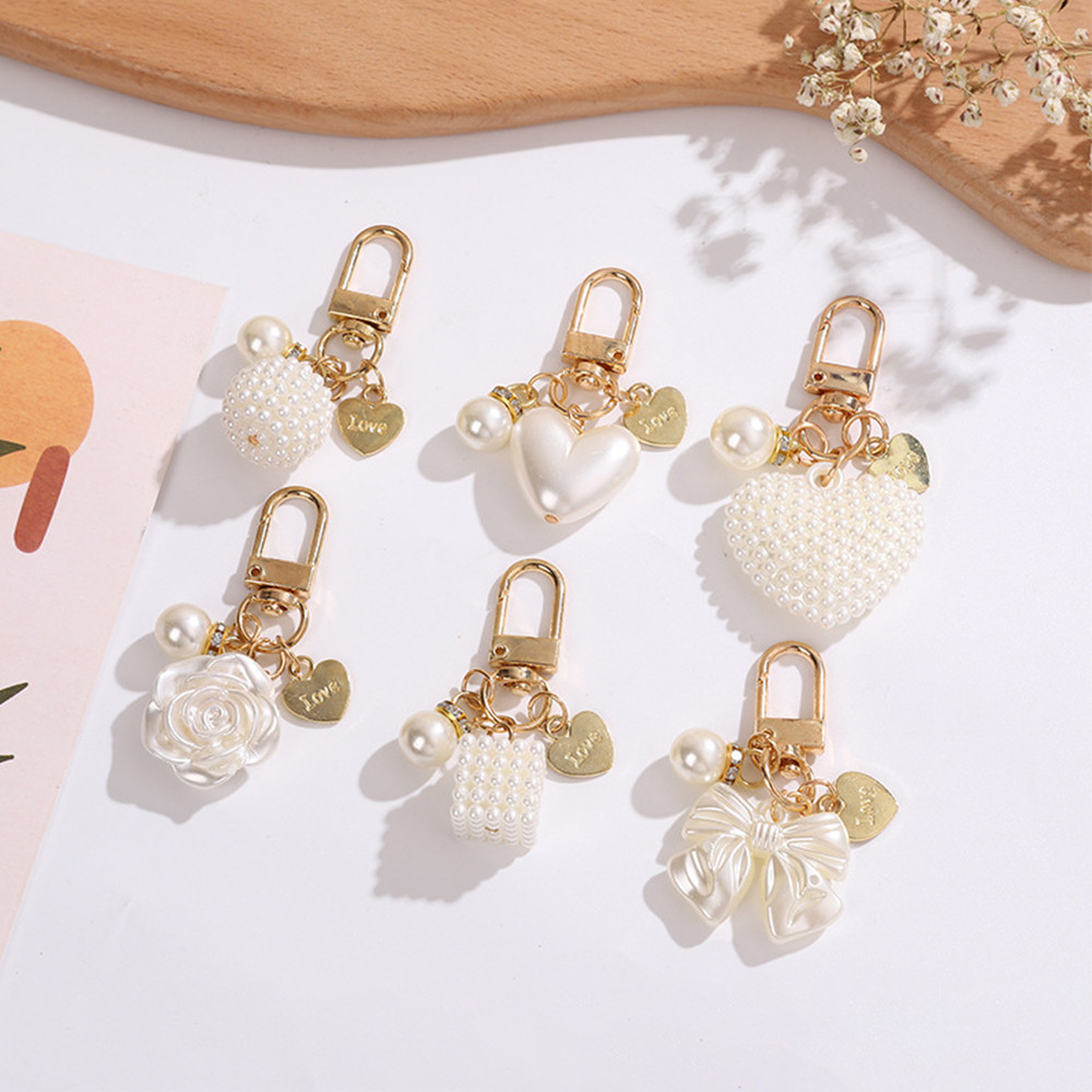 Elegant Rose Bowknot Key Chain Vintage Pearl Key แหวนสําหรับสาวกระเป ๋ าหูฟังจี ้ Key อุปกรณ ์ เสริมของขวัญ