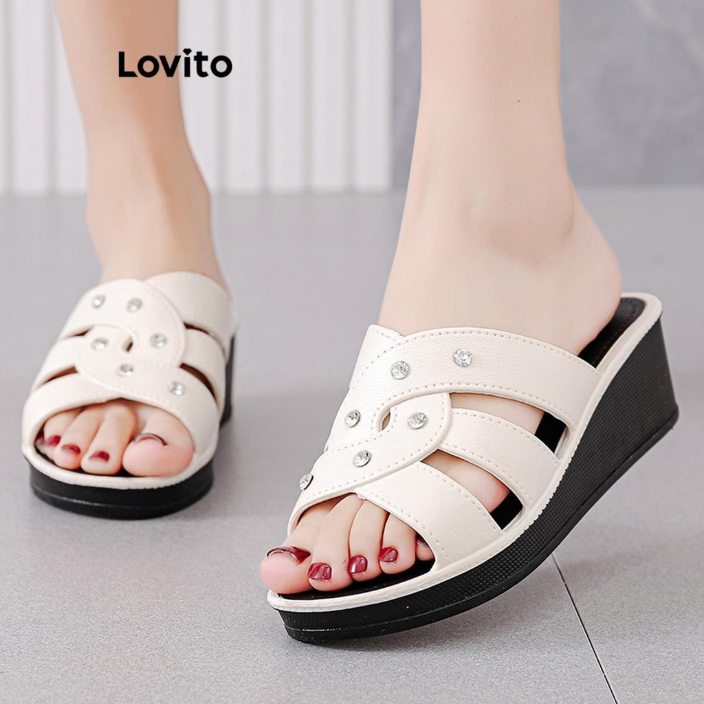 Lovito รองเท้าแตะส้นแบน ไขว้ธรรมดาลําลองสําหรับผู้หญิง LFA66212