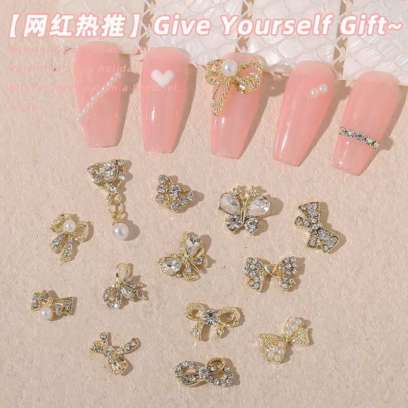 10Pcs เครื ่ องประดับโบว ์ เล ็ บขายส ่ งสุทธิสีแดงระเบิดดอกไม ้ โลหะผสมอุปกรณ ์ ตกแต ่ งเล ็ บหรูหรา