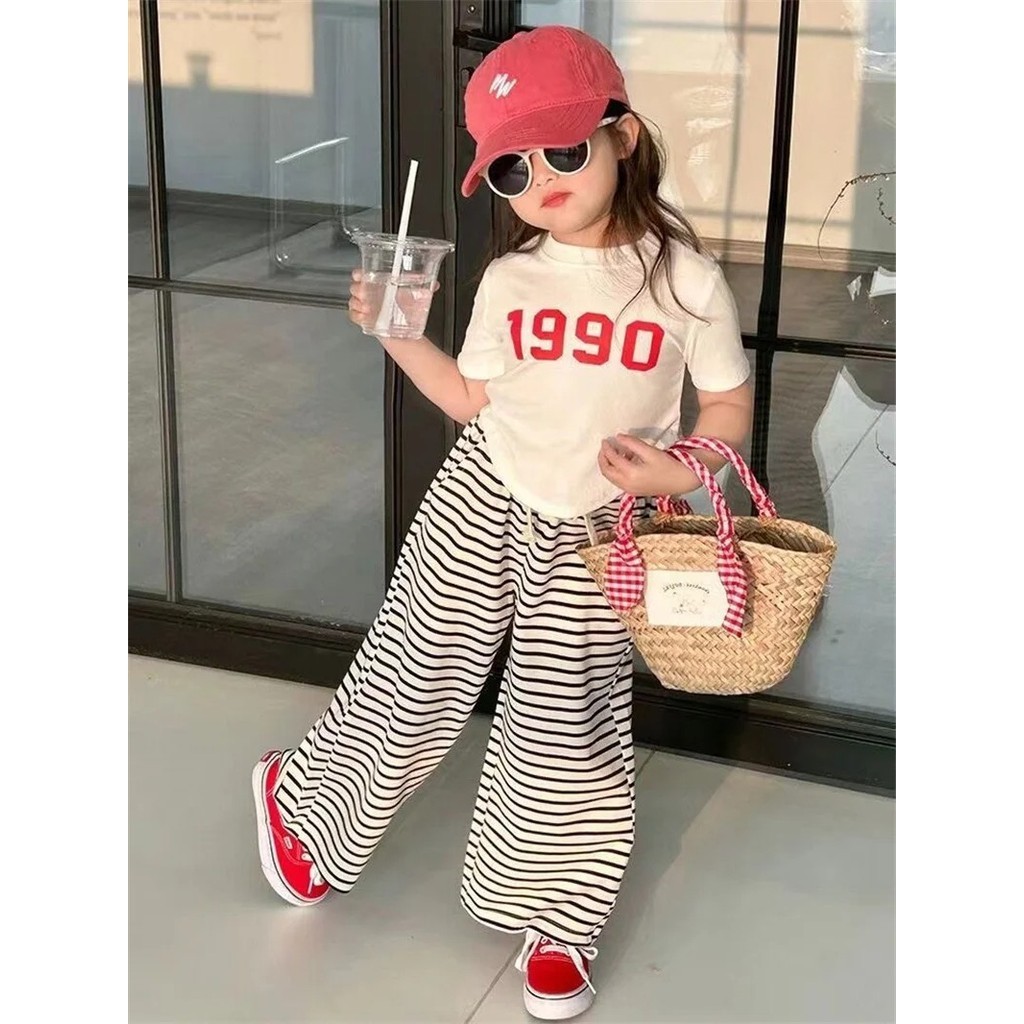 สาวใหม่แขนสั้นชุดฤดูร้อนเด็กเสื้อยืดเสื้อผ้าชุดไม่สม่ําเสมอเสื้อ + กางเกงลาย 2 ชิ้นเด็กชุดแฟชั่น 2-8 ปี